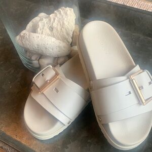 All Saints Cream Slides with Gold Accent